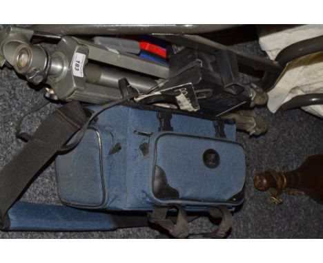 Cameras - a Temron lens;  an Olympus lens;  two Olmypus CM30 camera bodies;  a tripod;  a Polaroid camera;  a light meter;  a