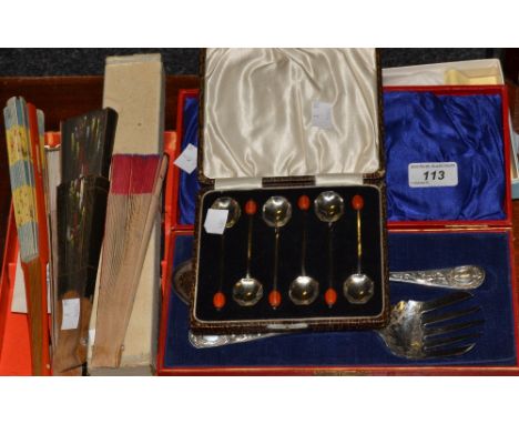 A boxed horn handled knife and fork set , cased silver plated coffee bean spoons, , cased silver plated cake knives; paper fa