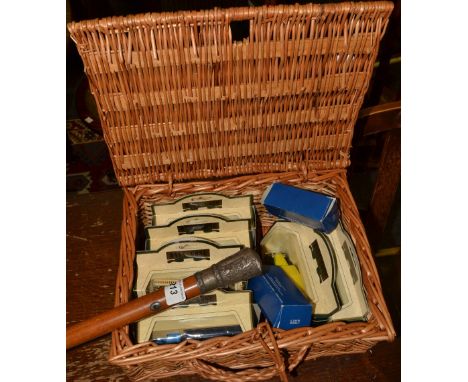 A silver mounted walking cane, malacca shaft, the end embossed with flowers;  a wicker hamper;  Days Gone By model cars