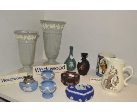 Wedgwood - a black jasperware vase and trinket box, a pair of tapering baluster vases, a blue jasperware table lighter ; a co