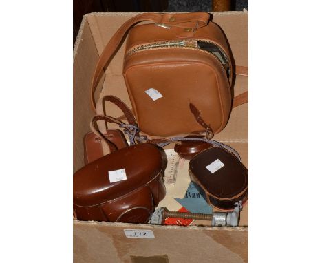 Photographic Equipment - a Zeiss Ikon Contina cased camera , light meter , table clamp and certificate and instruction bookle