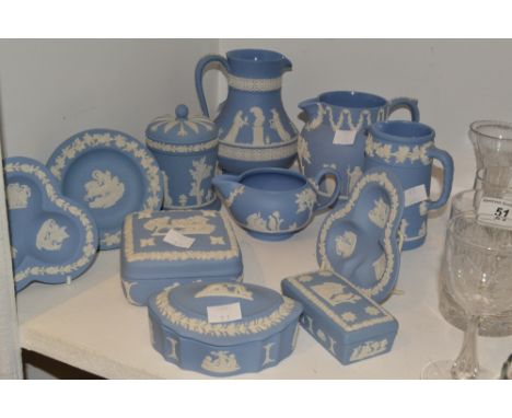 Wedgwood Jasperware - a blue jasperware ovoid jug, pin tray, cream jug, milk jug, trinket pot and cover ;  etc 