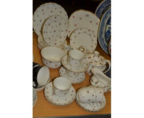 A Staffordshire tea service decorated with pink rosebuds 