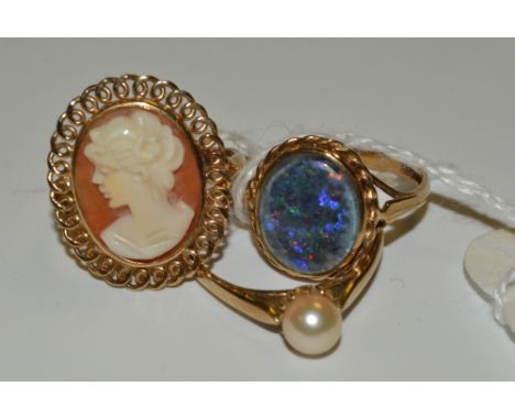 A 9ct gold cameo ring;  a 9ct gold glass opal ring;  a 9ct gold pearl ring (3)