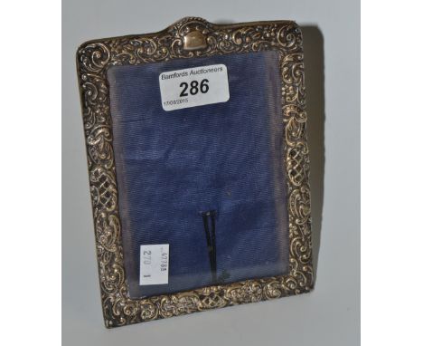 A Victorian silver easel photograph frame, 17cm high, 12.5cm wide, Birmingham 1900