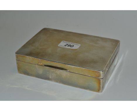 A silver cigarette, box, cedar lined, engine tuned, 16.5cm x 11.5cm, Birmingham 1940