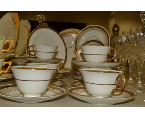 A Staffordshire tea service , decorated with a gold band and Greek Key pattern 