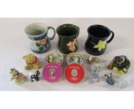 3 Moorcroft style mugs, Wade figures inc The Hat Box Series (two boxed), Coalport Paddington waits for a train and a Goebel e
