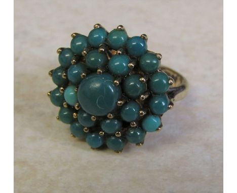 9ct gold turquoise cluster ring, size J/K, hallmarked London 1979, total weight 5.1 g