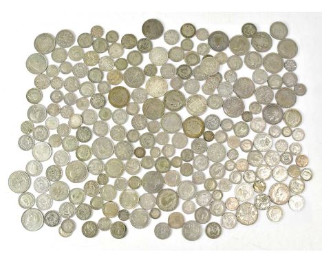 A quantity of UK half-silver coinage to include half-crowns, florins, shillings, sixpences, threepences etc.Condition Report: