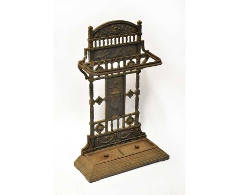 A 19th century Coalbrookdale-style cast iron large stick stand of Classical design, with two drip trays, cast registration di