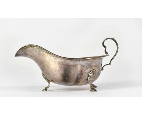 C W FLETCHER &amp; SONS LTD; a George V hallmarked silver sauce boat, Sheffield 1934, approx 3.14oztCondition Report: Dent/cr