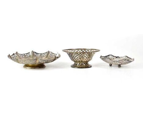 WILLIAM BASE &amp; SONS; a George V hallmarked silver pierced chequered footed bowl, Birmingham 1921, height 7cm, diameter 15