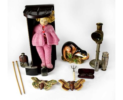 A collectors' lot comprising an Esco Bakelite bookcase, a silver-plated leather cased hip flask, a pair of pottery wall plaqu