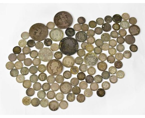 A quantity of UK silver coinage to include crowns, florins, threepennies, two maundy examples etc.Condition Report: Total wei