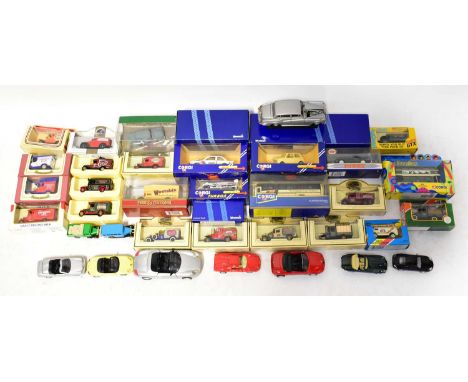A quantity of boxed and loose scale model vehicles from makers including Corgi Classic Models, Models of Yesteryear, Maisto, 
