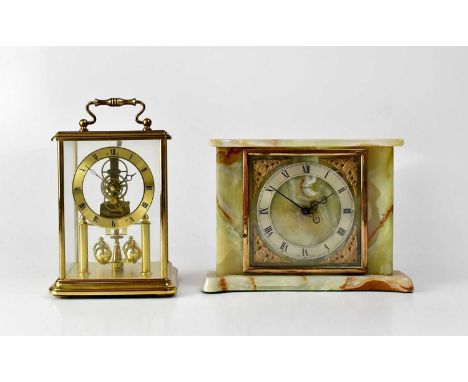 H. SAMUEL; a brass-effect cased modern anniversary clock, with swing handle, height 19cm, together with a Tempora onyx cased 
