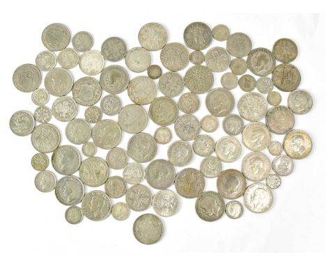 A quantity of UK half-silver coinage to include half-crowns, florins, shillings, sixpences, threepences etc.Condition Report: