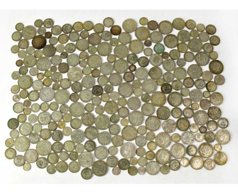 A collection of UK half-silver coinage to include half-crowns, florins, shillings, sixpences, threepences, etc.Condition Repo