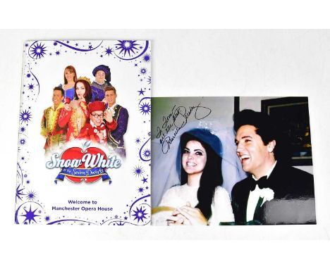 PRISCILLA PRESLEY; a signed photograph by Priscilla Presley and a pantomime catalogue starring Priscilla Presley (2).Conditio