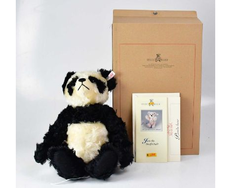 STEIFF; a German collectors' bear 'Panda', with growler, no. EAN661013, height 40cm, 2002, limited edition no.00149, with whi