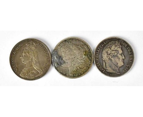 Three silver coins, comprising a cased 1887 Victorian crown, an 1882 Morgan Dollar, and a Louis Philippe I 1837 5 Franc, Roue