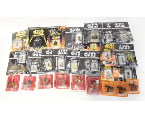 A large quantity of Star Wars magazines with attached carded and boxed figures, published by Lucas Books (2).Condition Report