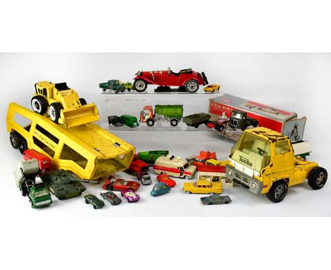 A quantity of playworn toys including a Tonka car transporter, a Tonka dumper truck, a boxed Solid State Rolls-Royce Phantom 