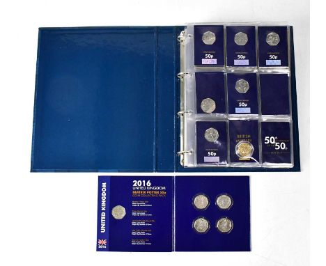 A folder containing a variety of 50p and £2 coins, including various Brilliant Uncirculated Change Checker examples, Star War