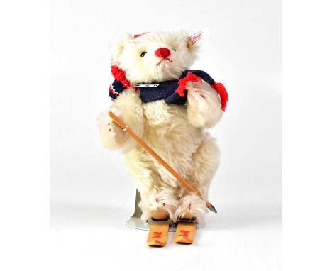 STEIFF; a German collectors' bear, 'Skier Bear', no. EAN037696, height 18cm, with stand, white tag, button ear, and associate