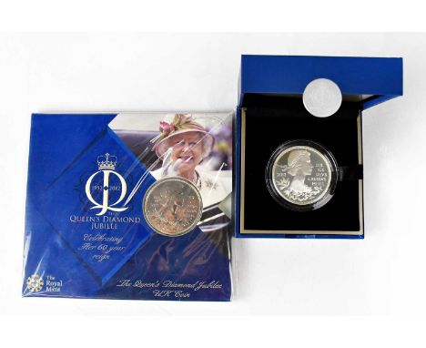 THE ROYAL MINT; two coins to include a cased 'The Queen's Diamond Jubilee Silver Proof £5', and a sealed 'Queen's Diamond Jub