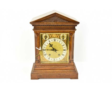 An early 20th century oak cased bracket clock with architectural oak case, the square dial with round chapter ring set with R