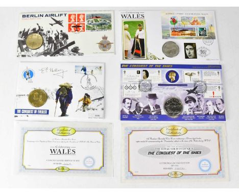 Four first day coin covers comprising 2003 Mount Everest 50th Anniversary with medal, limited edition no.0083, a 1999 Berlin 