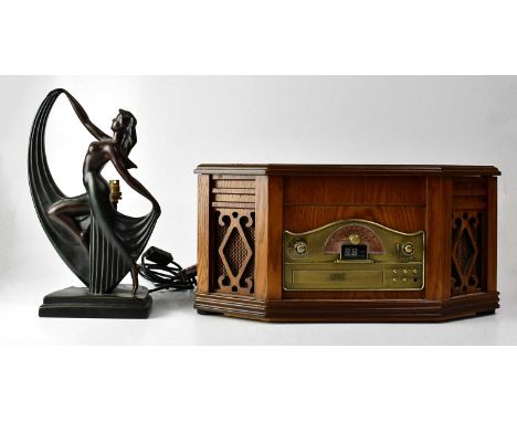 An Art Deco style bronze-effect table lamp in the form of a semi-nude dancing woman, on a stepped base, height 36cm, together