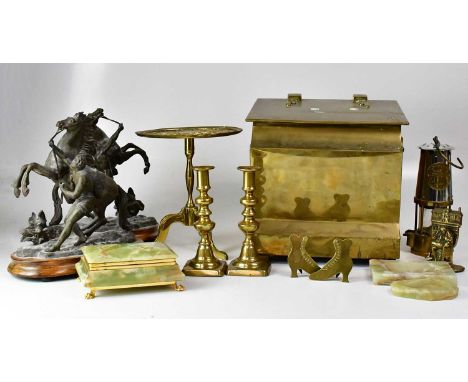 A small pair of spelter Marly horses, on later wooden bases, a pierced brass trivet, a pair of brass candlesticks, a Protecto