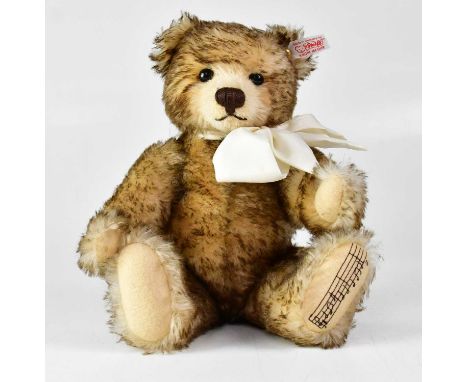 STEIFF; a German musical collectors' bear 'The English Teddy Bear', no. EAN660979, height 30cm, limited edition no.02378, wit