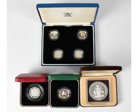 A Bahamas Anniversary Prince Charles ten dollar proof silver coin, a new 1992 Piedfort silver proof fifty pence piece, a furt