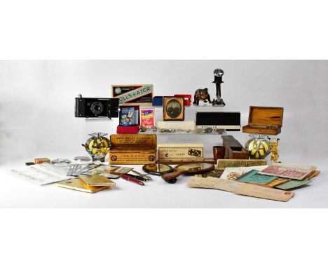A collectors' lot to include various ephemera, vintage cards, ration books, postcards, commemorative stamps, a camera, domino