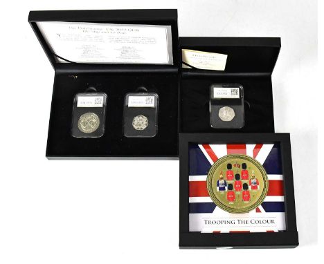 Two cased coin sets, comprising 'DateStamp 2022 QEII Brilliant Uncirculated 50p and £5', a '2024 Brilliant Uncirculated 50p',
