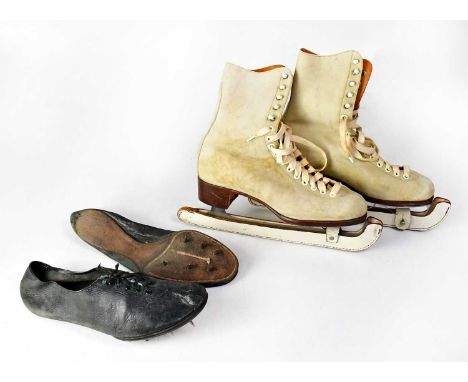 SPALDING; a pair of vintage cream leather ice skates, stamped '9 3/4' to the blades, with 'Silver Blades' blade covers, toget