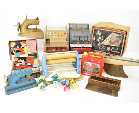 Various items of vintage toys including a boxed Vulcan children's sewing machine, two further sewing machines, a musical TV w