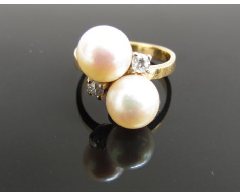 A pearl and diamond ring, Shank unmarked. Size I, 4.3g