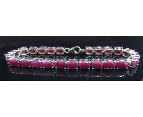 A Ratnapuri ruby sterling silver bracelet, 19.5cm long, 20.2g, with certificate