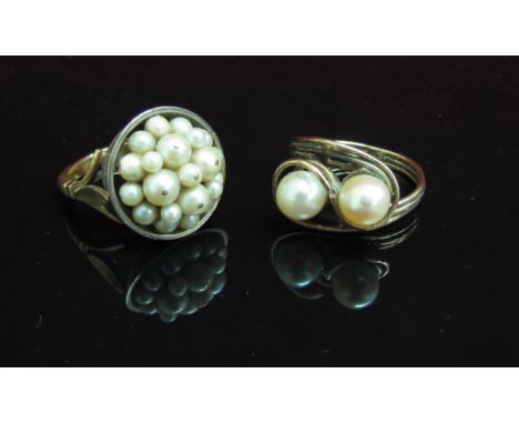 Two pearl set rings, one stamped 18ct/9ct. Size Q, the other unmarked. Size R, 14.6g