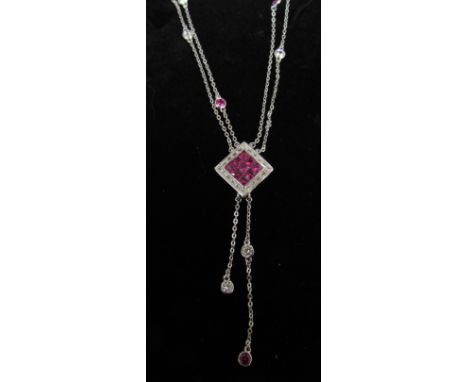 A simulated diamond and simulated ruby pendant necklace, clasp stamped 925