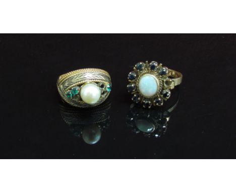 Two dress rings one with single pearl. Size L the other opal and sapphire, stones missing, stamped 14k. Size P (2) 10.6g