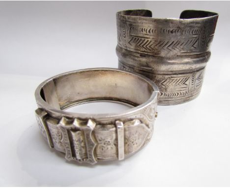 A Victorian silver bangle, Birmingham and another ethnic bangle