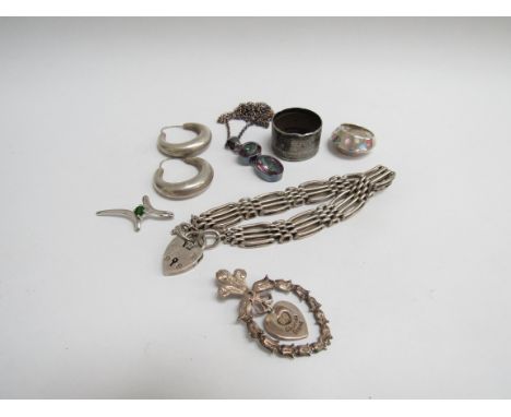 A bag of silver bijouterie including four bar gate bracelet, ring etc