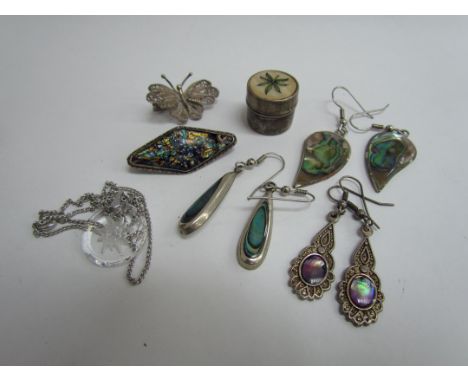 A collection of jewellery including three pairs of paua shell earrings, silver brooches and trinket pot