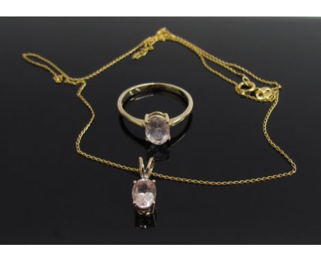 A 9ct gold pink Morganite ring. Size N, 1.7g with a matching pendant hung on 9ct gold chain, 50cm long, 1.3g